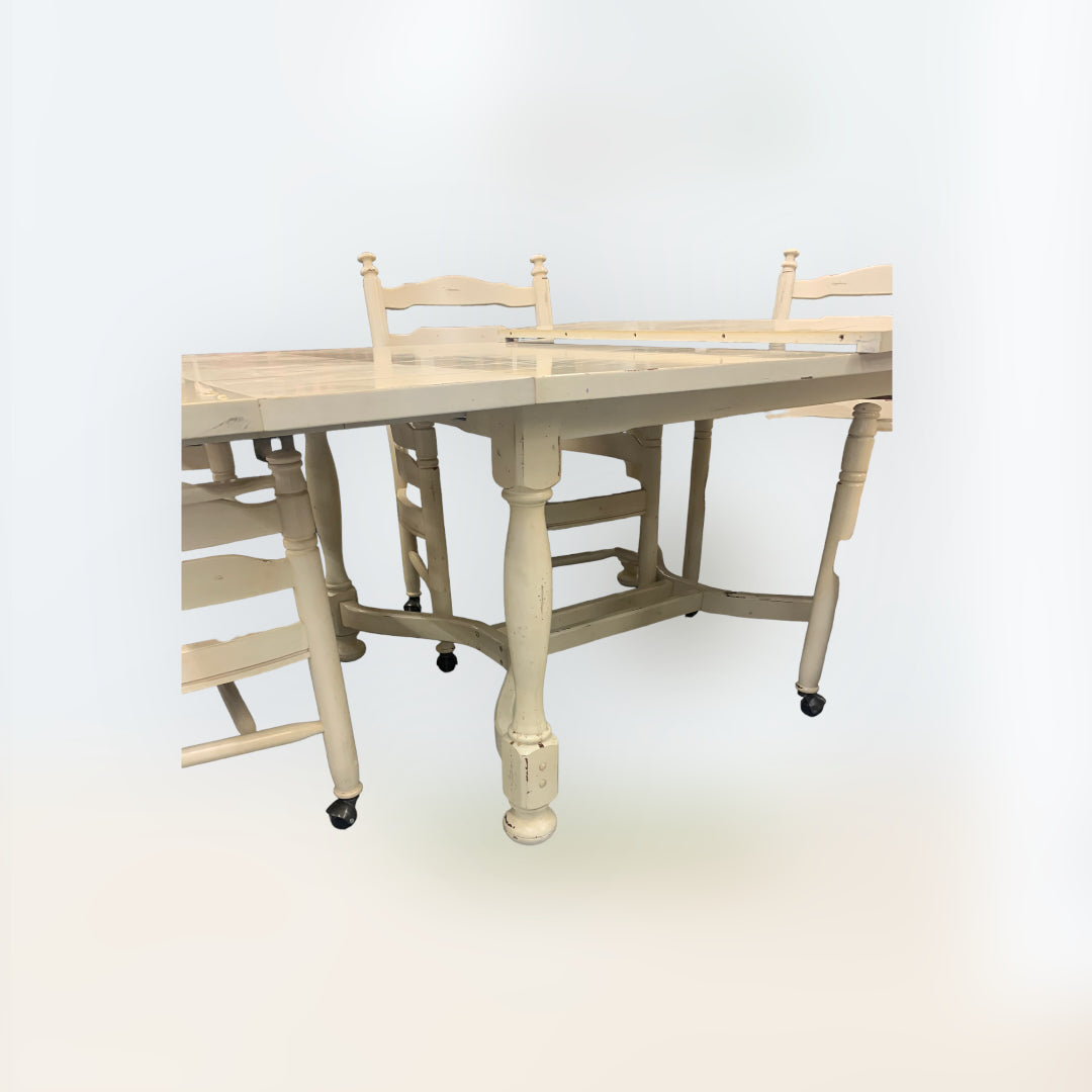 VINTAGE TABLE AND 4 ROLLING CHAIRS